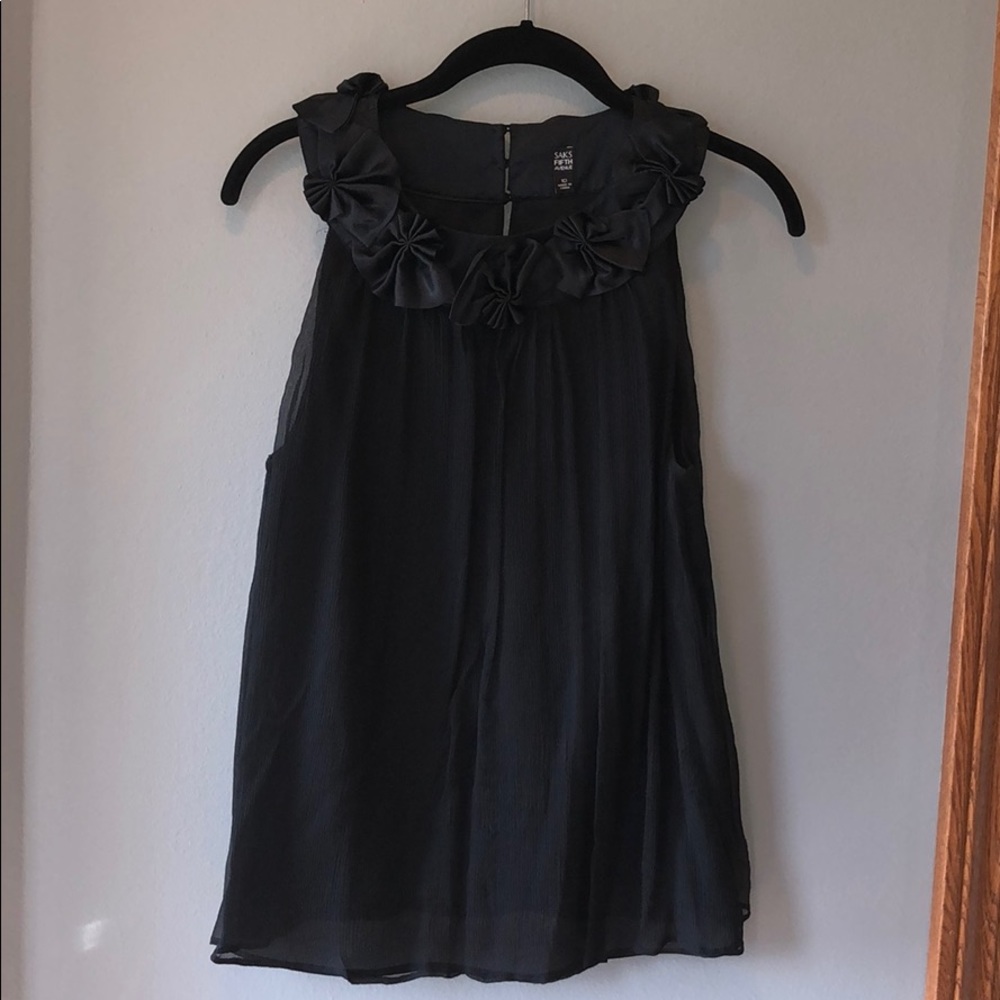 Black Saks Fifth Ave top w flowers around the neck
